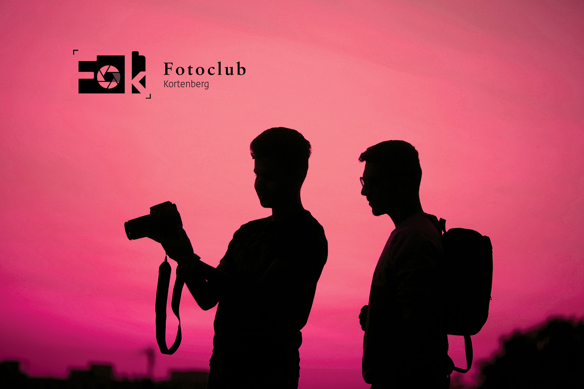 Two photographers on a red sky