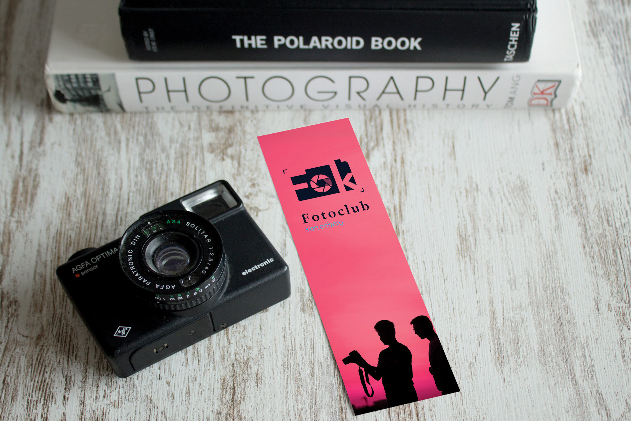 Bookmark of two photographers on a red sky