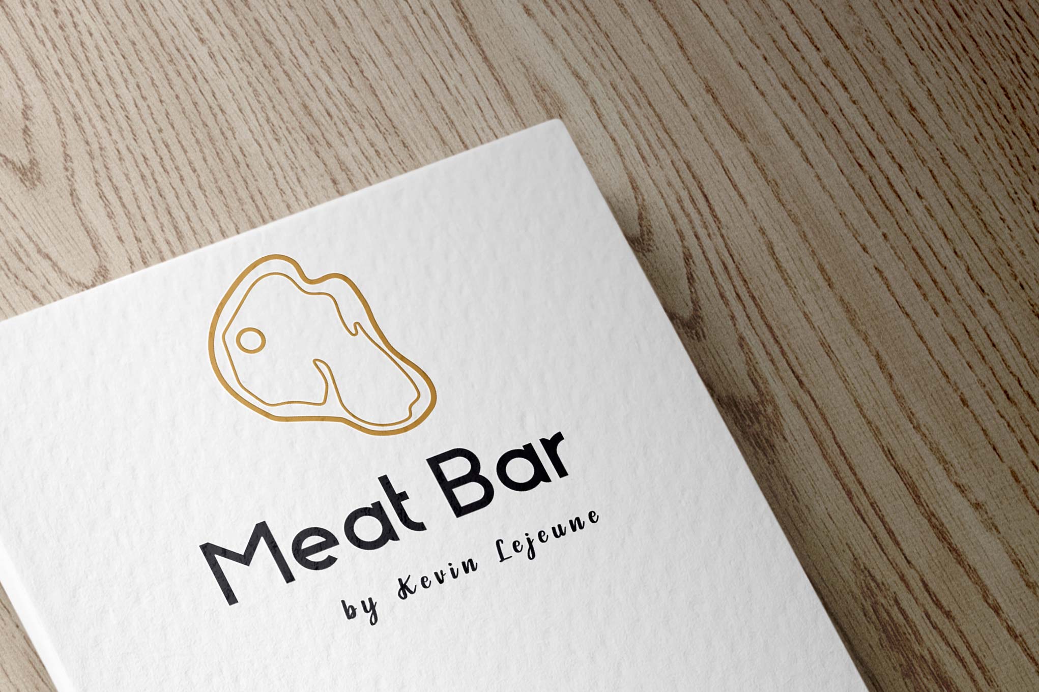 Logo of stylized piece of meat on a white book